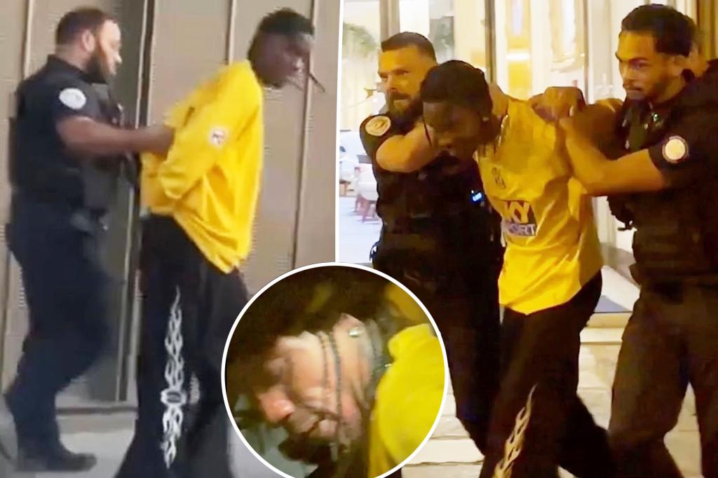 Travis Scott es visto siendo arrastrado desde un hotel de París tras su arresto en video